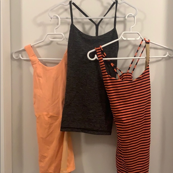 Bundle of Lululemon Tanks with fitted bra shelves - Picture 1 of 7